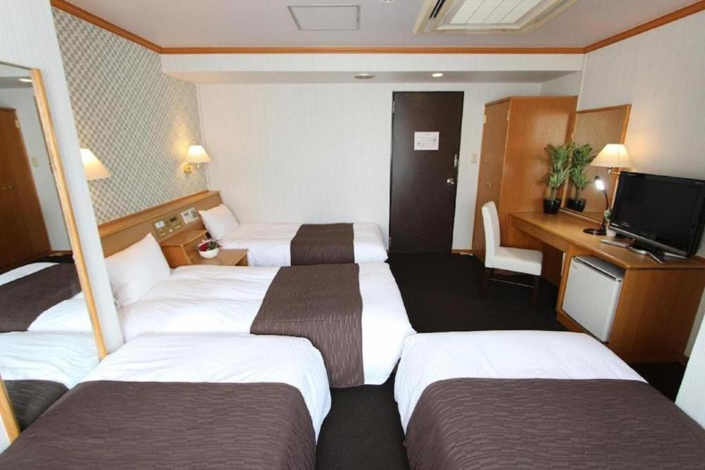 Hotel Livemax Budget Naha Tomarikou Extérieur photo