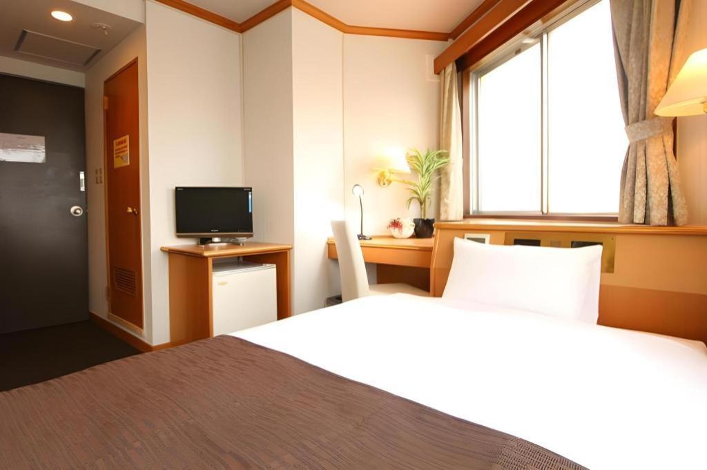Hotel Livemax Budget Naha Tomarikou Extérieur photo