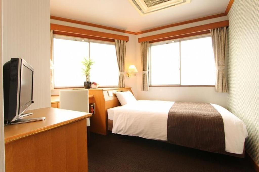 Hotel Livemax Budget Naha Tomarikou Extérieur photo
