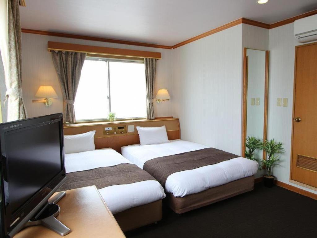 Hotel Livemax Budget Naha Tomarikou Extérieur photo