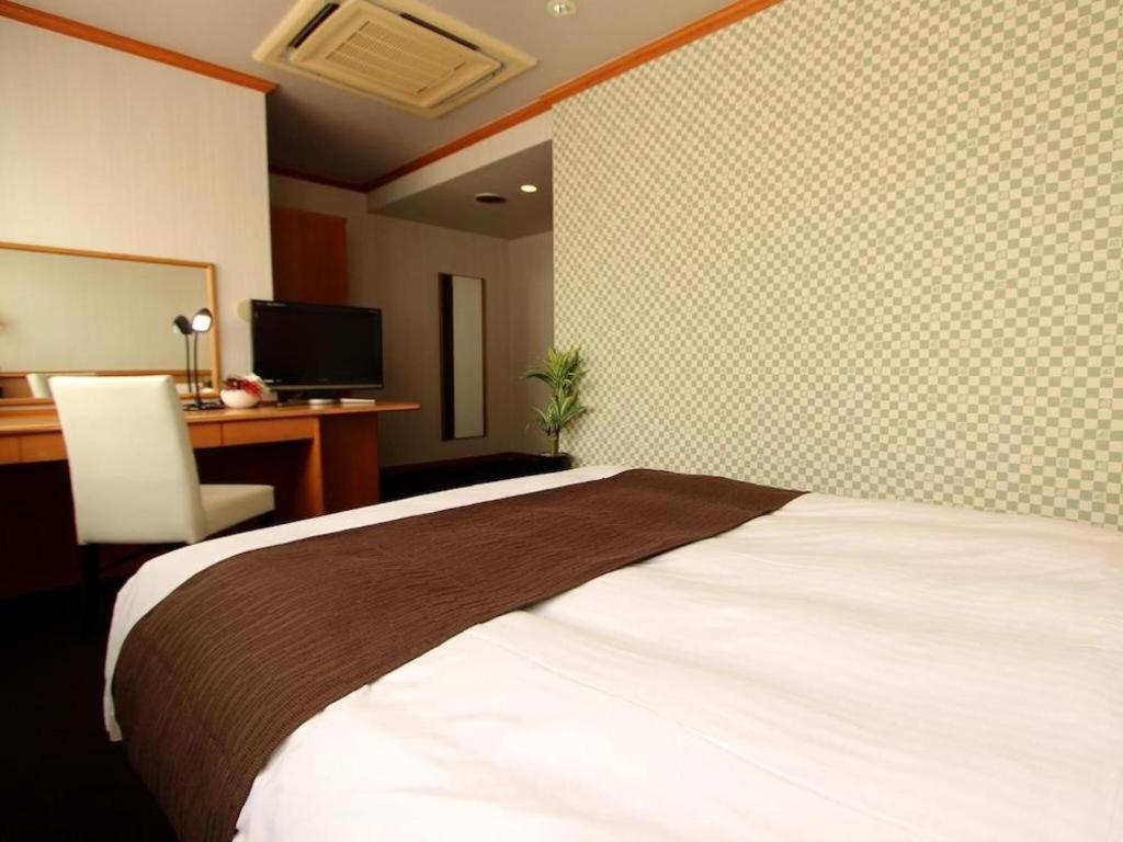 Hotel Livemax Budget Naha Tomarikou Extérieur photo